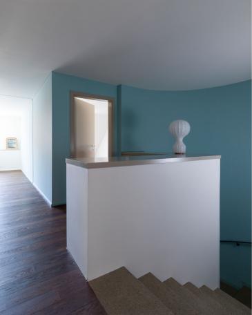 Townhouse Aarau staircase with colored wall