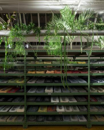 Designers’ Saturday 2016 detail Pendularis indoor floating garden in front of shelf with coloured fabric samples at Création Baumann